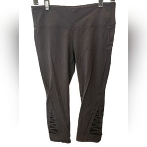Athleta black capri leggings with side cutouts